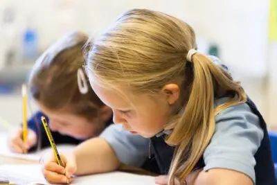 Young students writing